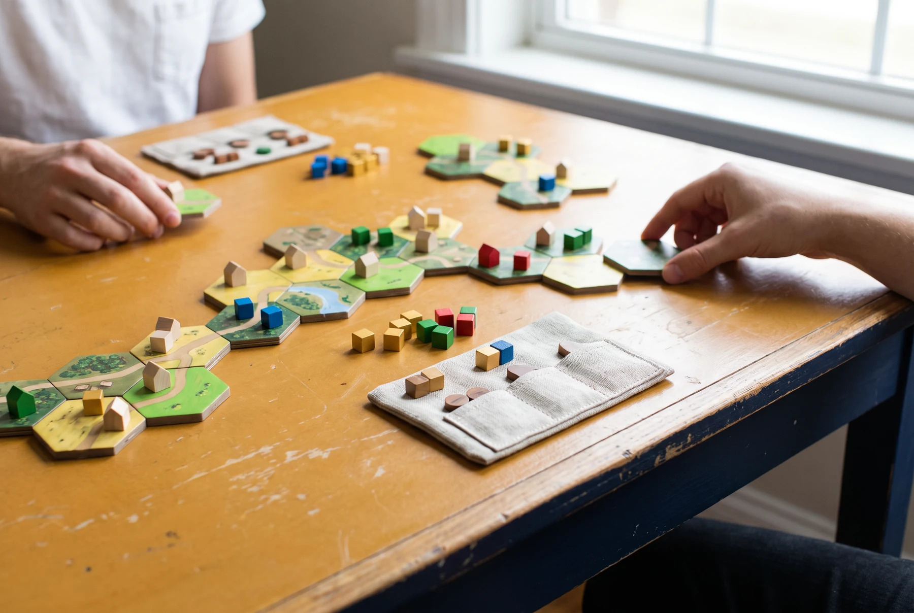 Modular landscape board game with small wooden houses